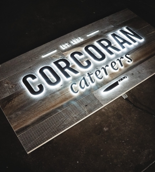 Corcoran Caterers Illuminated Sign