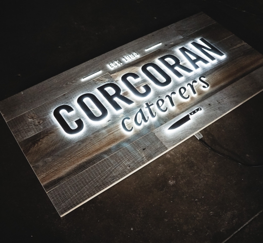 Corcoran Caterers Illuminated Sign