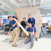 Slat wood divider wall installation for Flexport, a freight forwarding and customs brokerage company based in San Francisco, California.