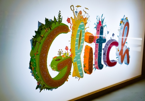 Backprinted full color lightbox sign with wood frame for Glitch, a browser-based, massively multiplayer online game—eventually becoming Slack.