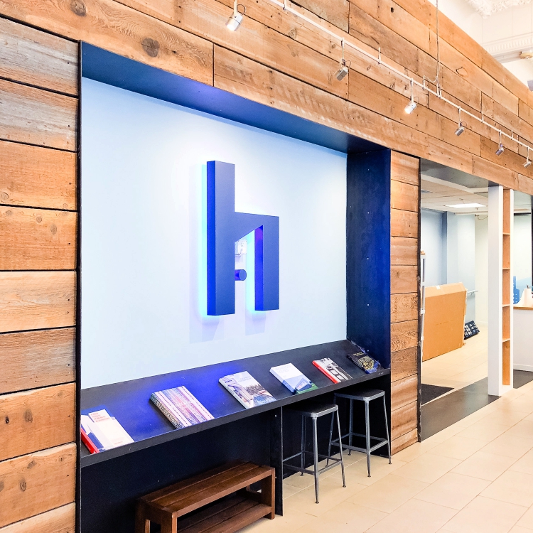 Blue painted, halo-lit, illuminated sign for HelloOffice, a San Francisco technology-powered commercial real estate brokerage helping companies search for office space.