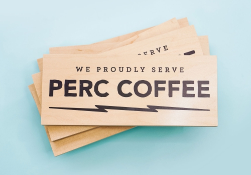 One of several wood retail signs for Perc Coffee, a coffee roaster based in Savannah, GA.