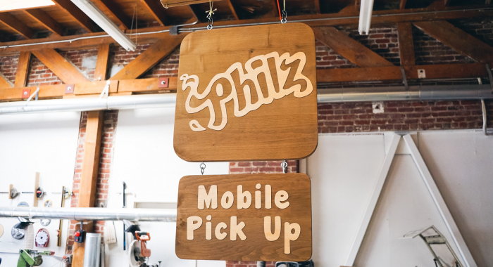 Wood hanging sign for Philz Coffee, an American coffee company and coffeehouse chain based in San Francisco, California, considered a major player in third wave coffee.