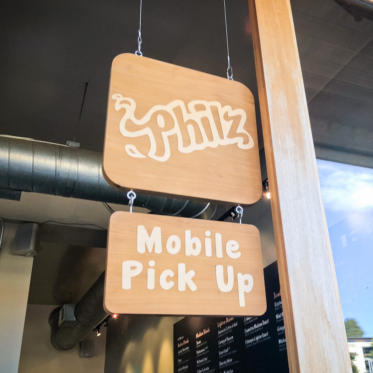 Wood hanging sign for Philz Coffee, an American coffee company and coffeehouse chain based in San Francisco, California, considered a major player in third wave coffee.