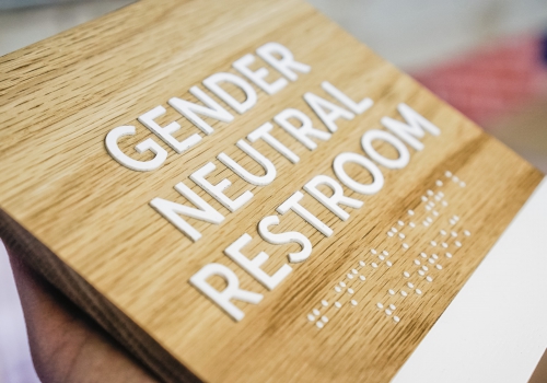 slack custom ada light wood restroom sign with braille