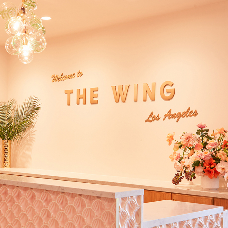 Retro, brass colored sign made from brushed, solid bronze for The Wing, a co-working space in Los Angeles.