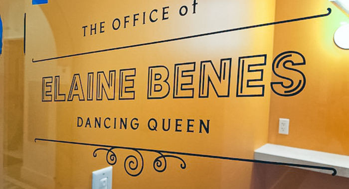 23k gold leaf signage honoring the names of iconic women, on glass doors at The Wing San Francisco, a co-working space for women.