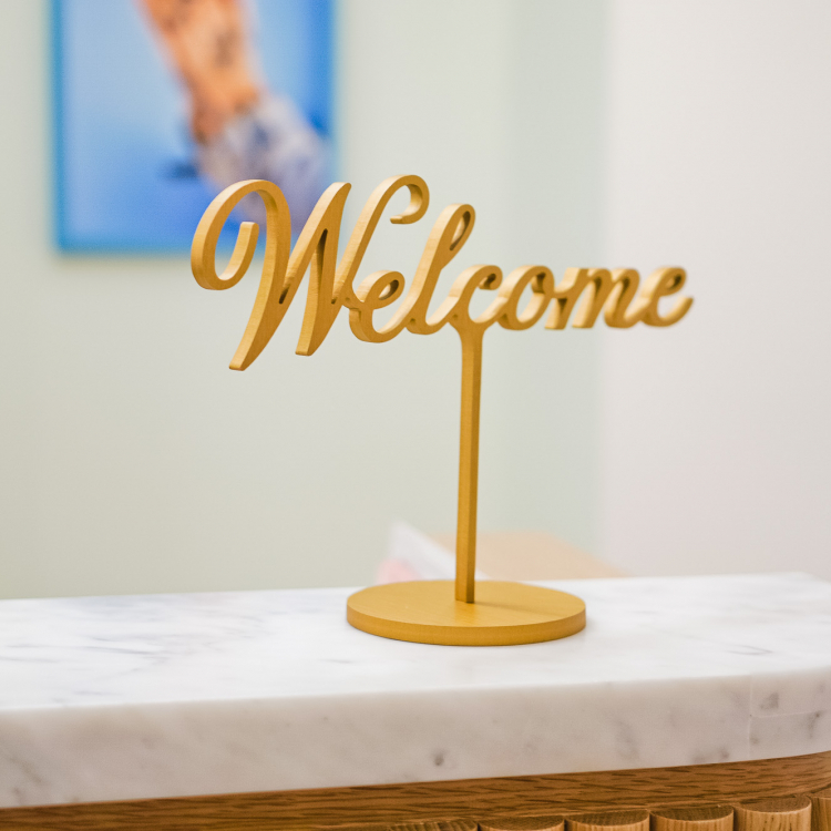 Freestanding Welcome sign at the front desk of The Wing San Francisco, a co-working space for women.